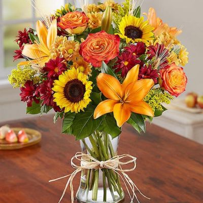 This wonderful autumn bouquet is gathered with fresh-picked flowers, revealing the rustic beauty of nature.
Shades of golden yellow, rich red and pops of orange create a timeless gift for someone special to enjoy.