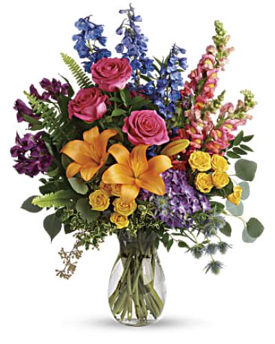 <div id="mark-3" class="m-pdp-tabs-marketing-description">A rainbow of beauty for any occasion. Purple hydrangea, pink roses and orange lilies positively pop in this bright bouquet, featuring all the colors of the rainbow.</div>
<div id="desc-3">
<ul>
<li>This colorful bouquet includes purple hydrangea, pink roses, yellow spray roses, orange asiatic lilies, purple alstroemeria, blue delphinium, pink snapdragons, blue eryngium, huckleberry, oregonia, Israeli ruscus, sword fern, silver dollar eucalyptus, seeded eucalyptus, and lemon leaf.</li>
</ul>
</div>